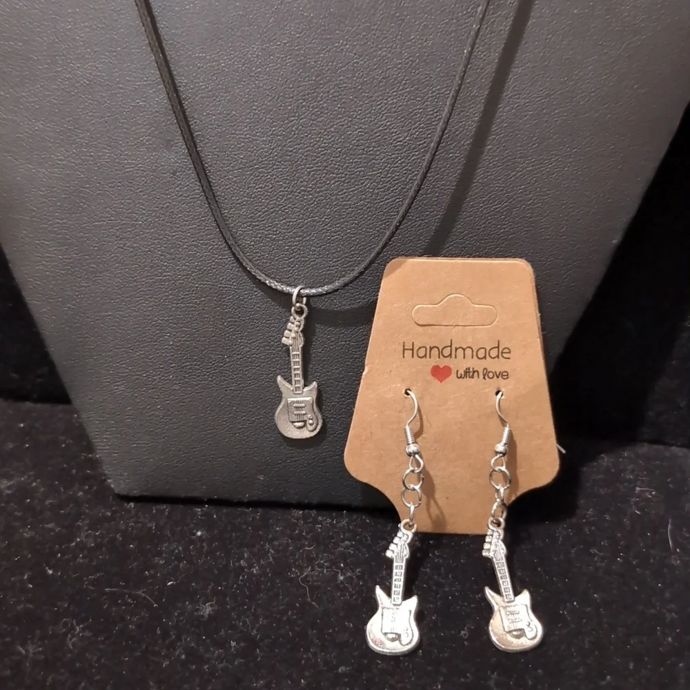 Black and silverl guitar dangle earrings and silver-tone electric guitar pendant